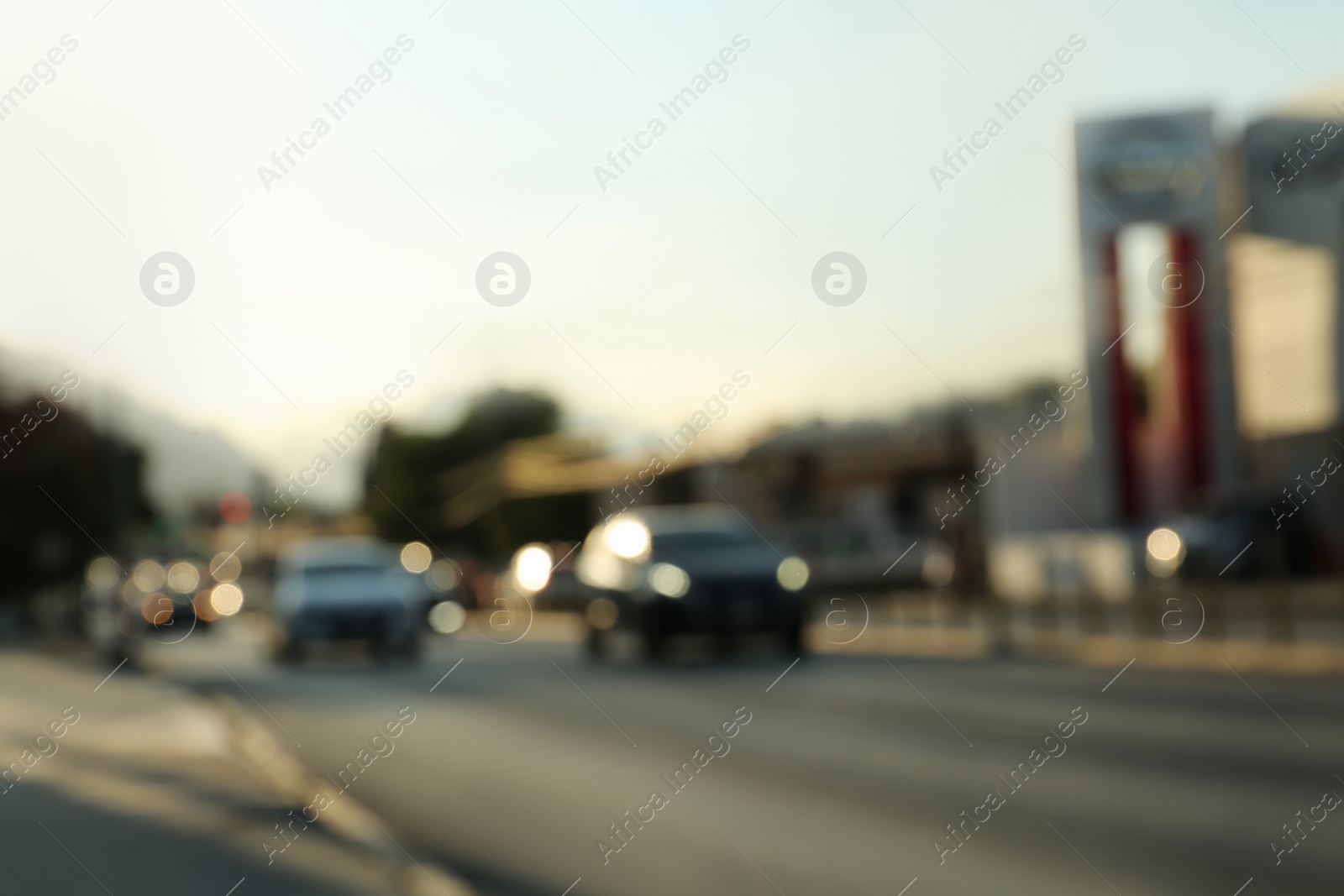 Photo of Blurred view of road with cars, bokeh effect