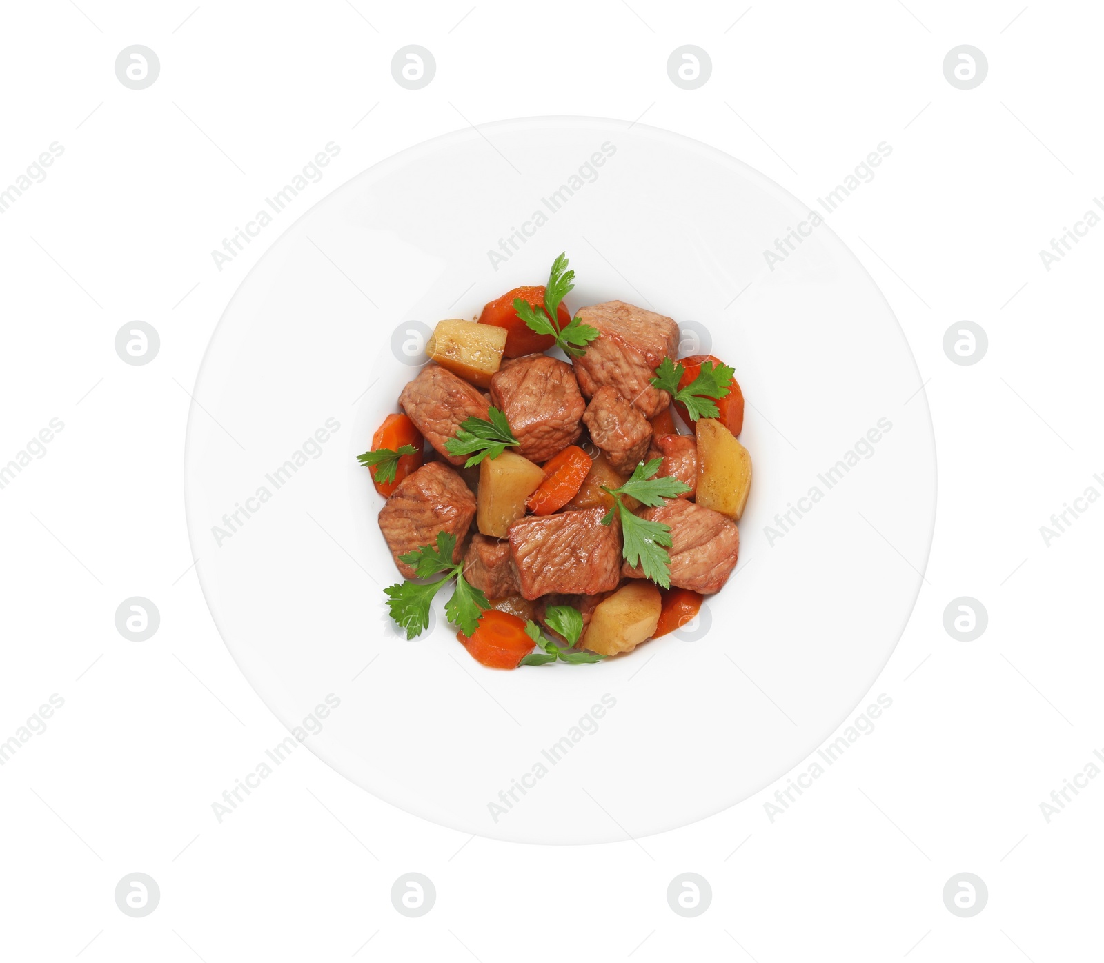 Photo of Plate with delicious goulash isolated on white, top view