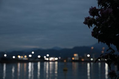 Photo of Port under cloudy sky in evening, blurred view