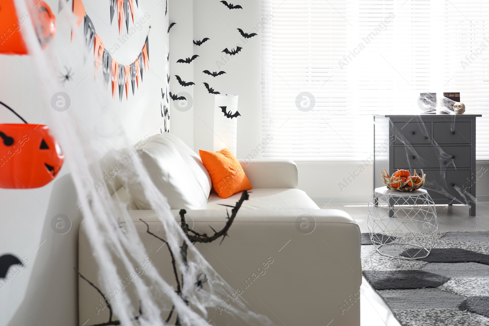 Photo of Modern room decorated for Halloween. Festive interior