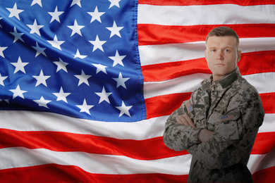 Image of Male soldier and American flag on background. Military service
