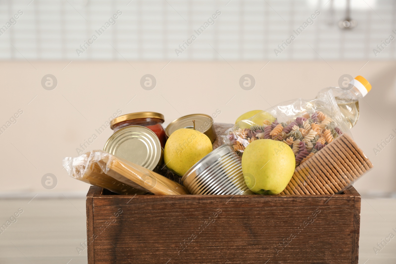 Photo of Donation box with many different products indoors