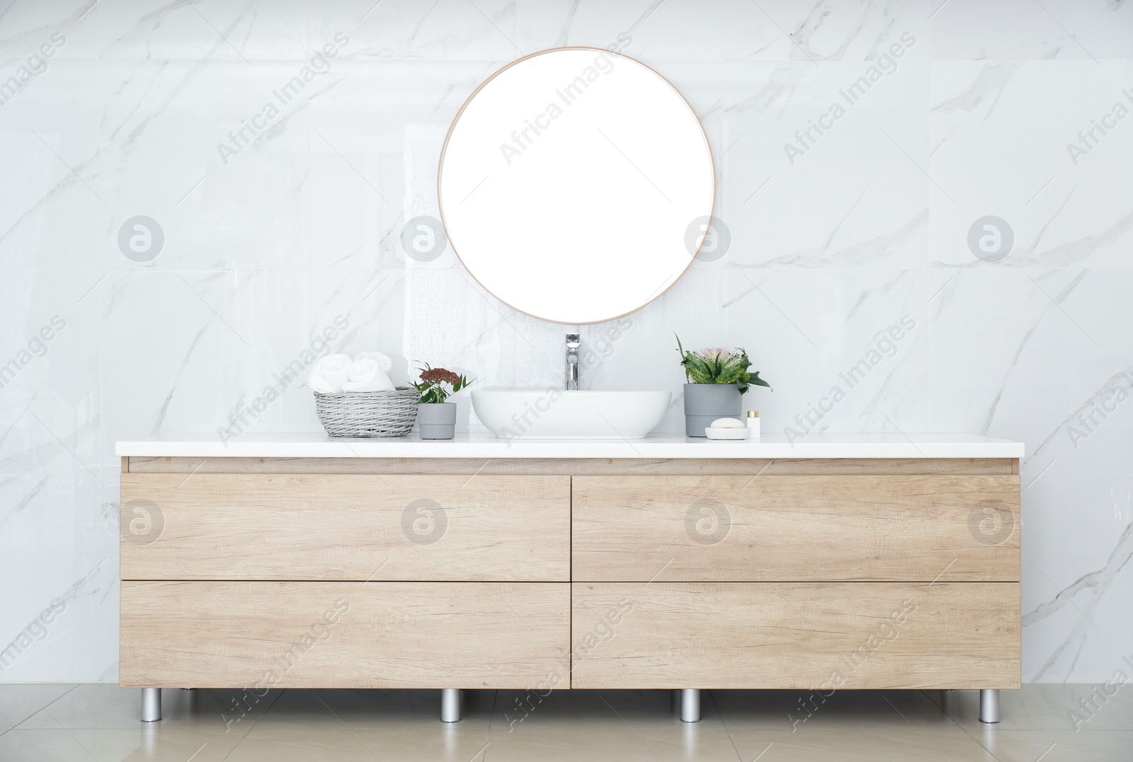 Photo of Modern bathroom interior with stylish mirror and vessel sink