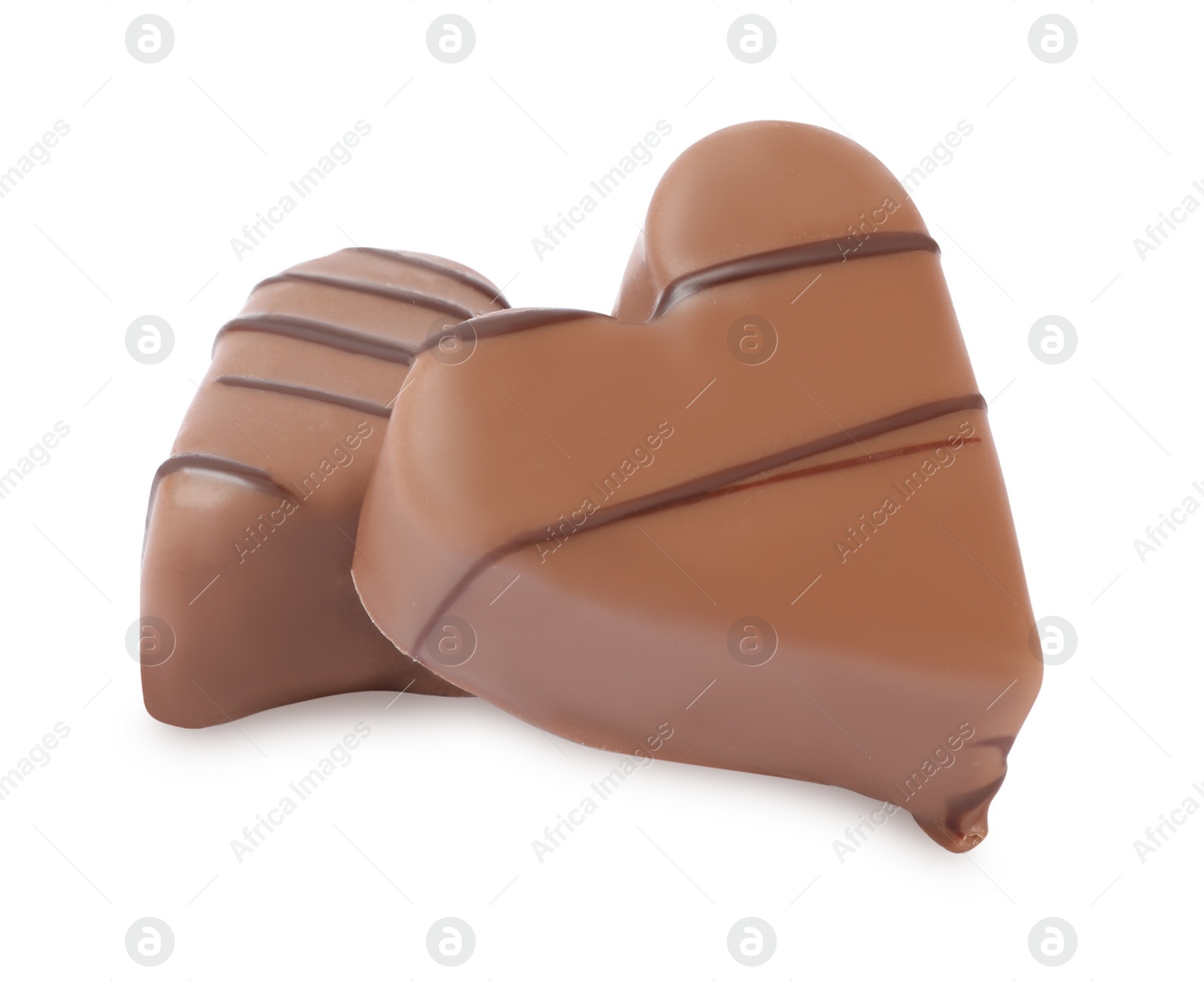 Photo of Beautiful heart shaped chocolate candies on white background