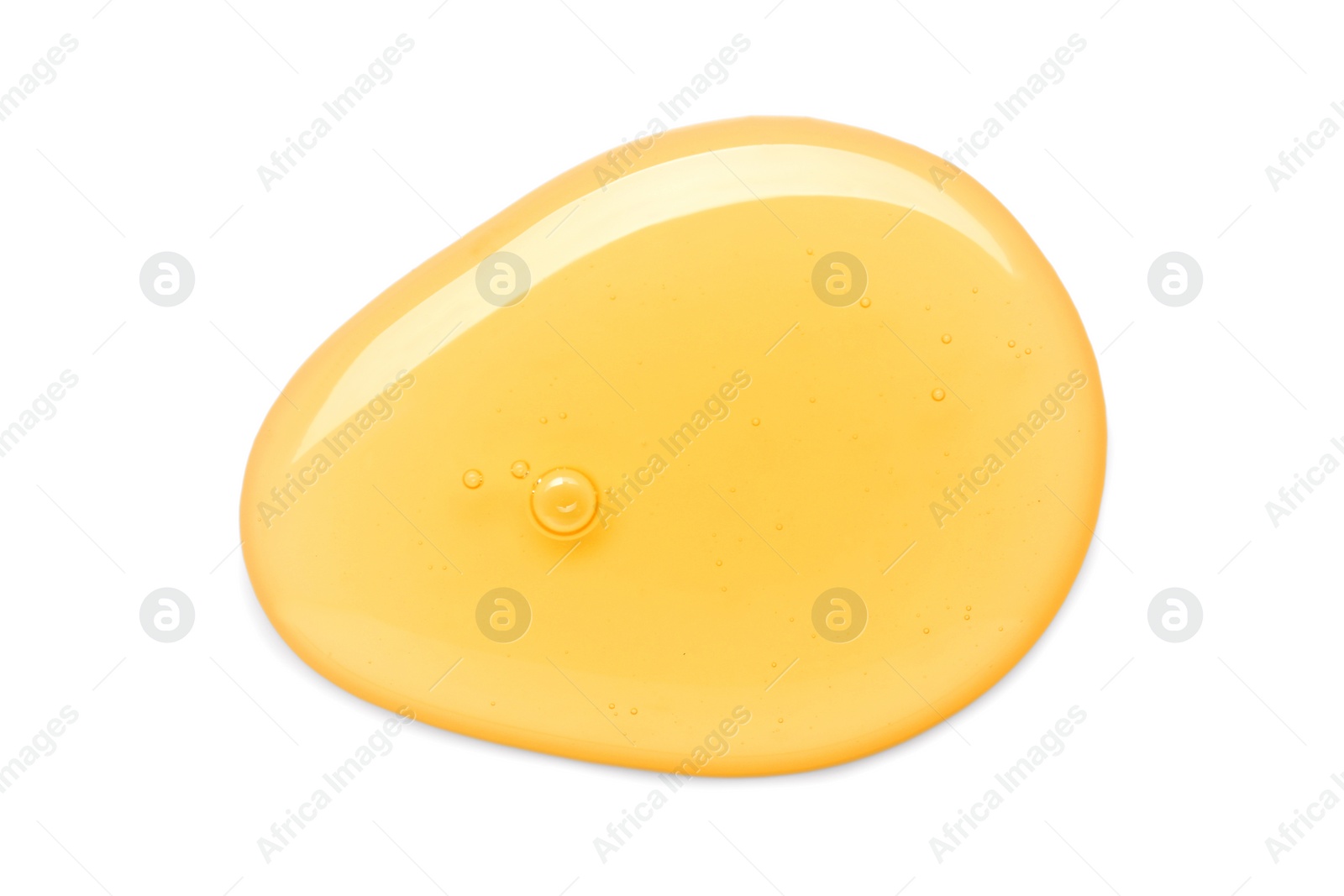 Photo of Drop of tasty natural honey isolated on white, top view