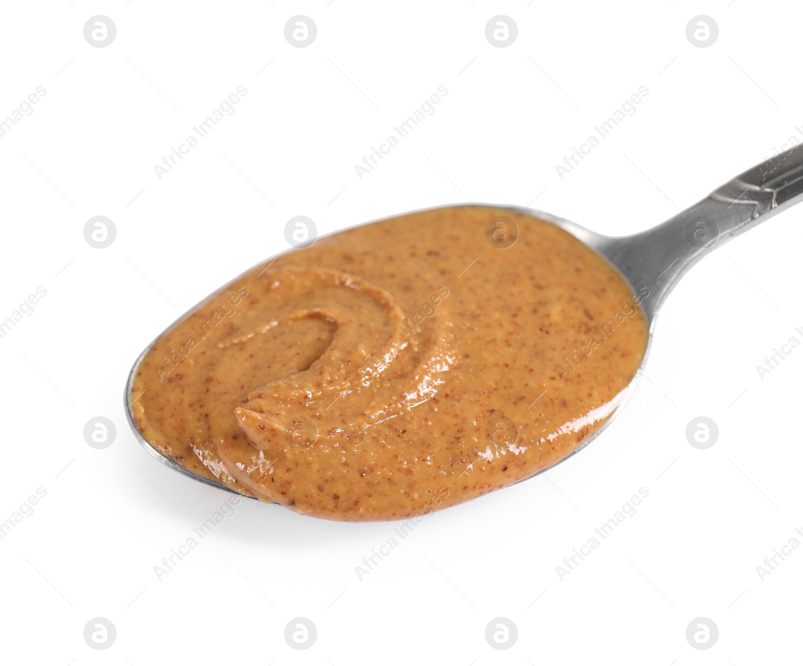 Photo of Delicious nut butter in spoon isolated on white