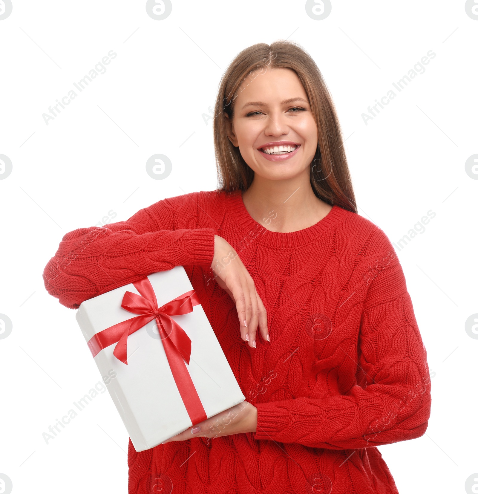 Photo of Happy young woman with Christmas gift on white background