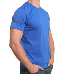 Man wearing blue t-shirt on white background, closeup. Mockup for design