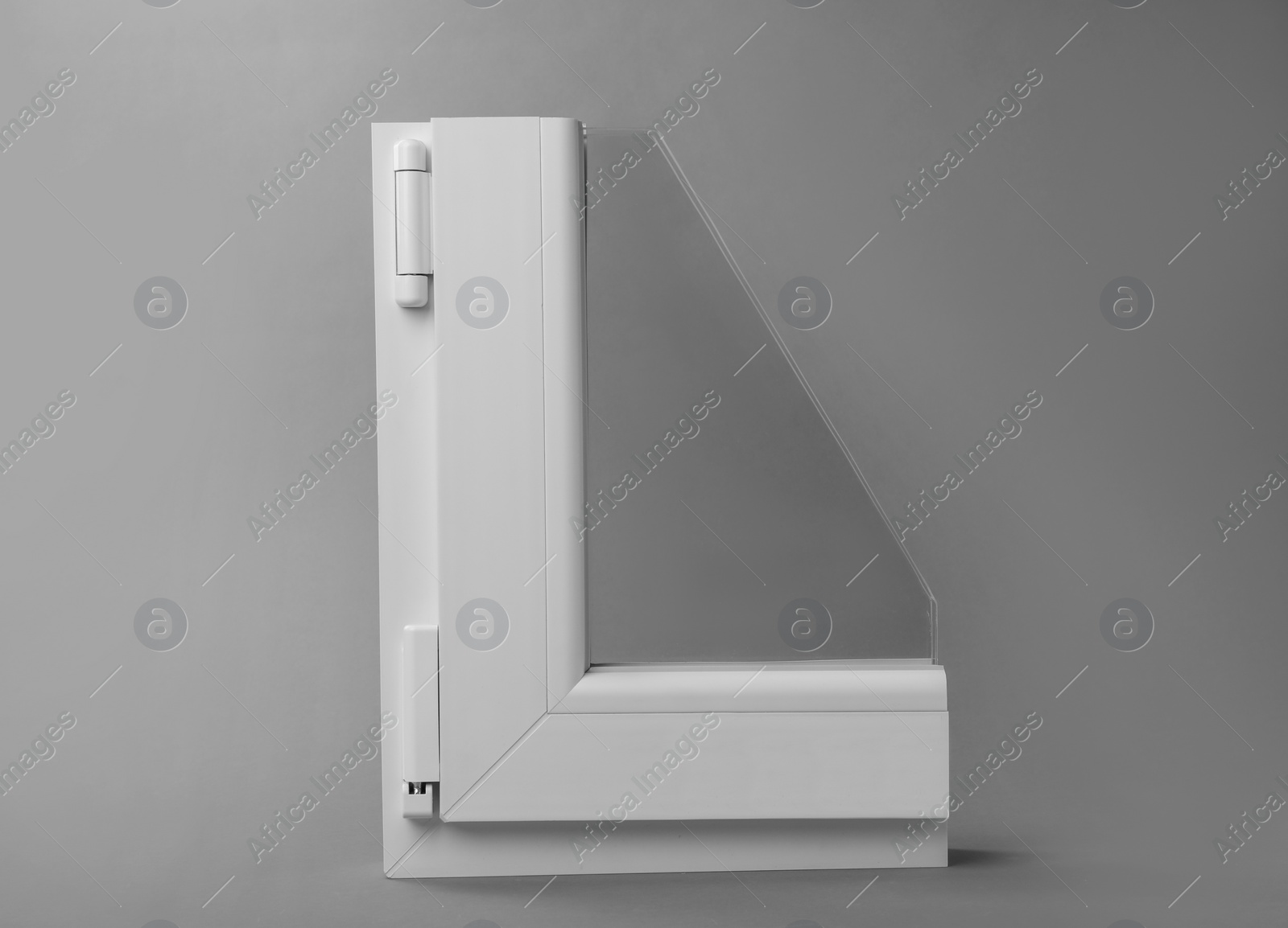 Photo of Sample of modern window profile on grey background