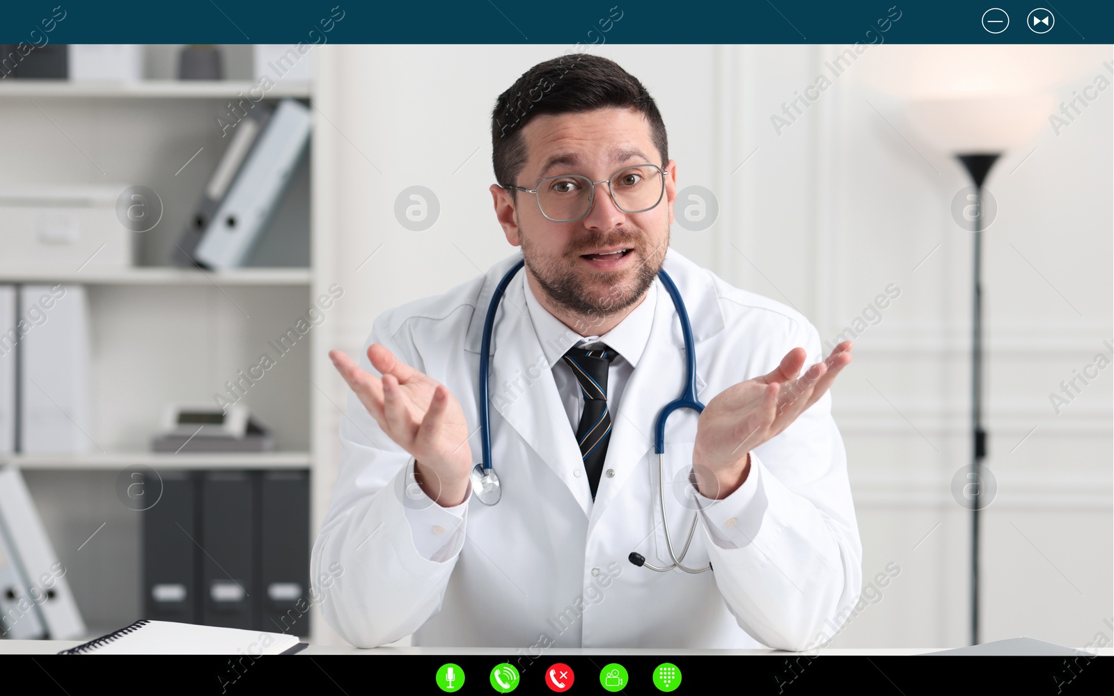 Image of Online medical consultation. Doctor working via video chat application