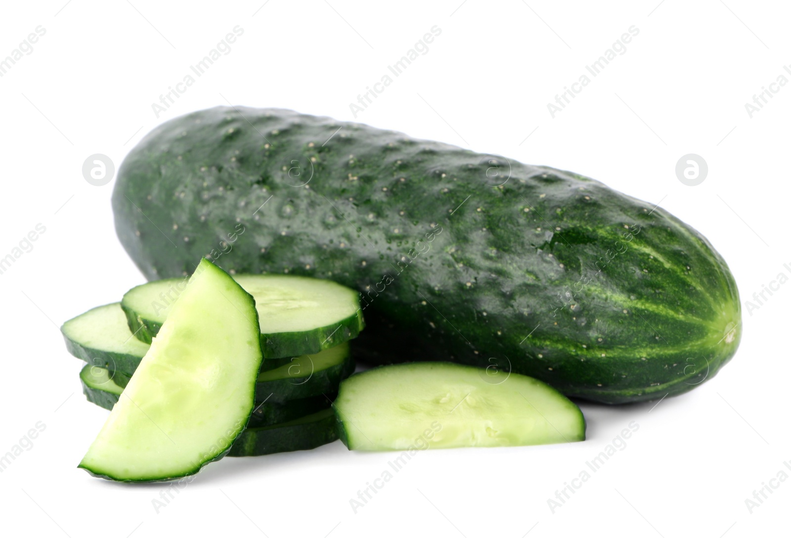 Photo of Whole and sliced fresh cucumbers on white background