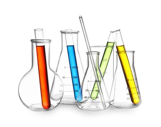Image of Glass flasks, beaker and test tubes with colorful liquids isolated on white