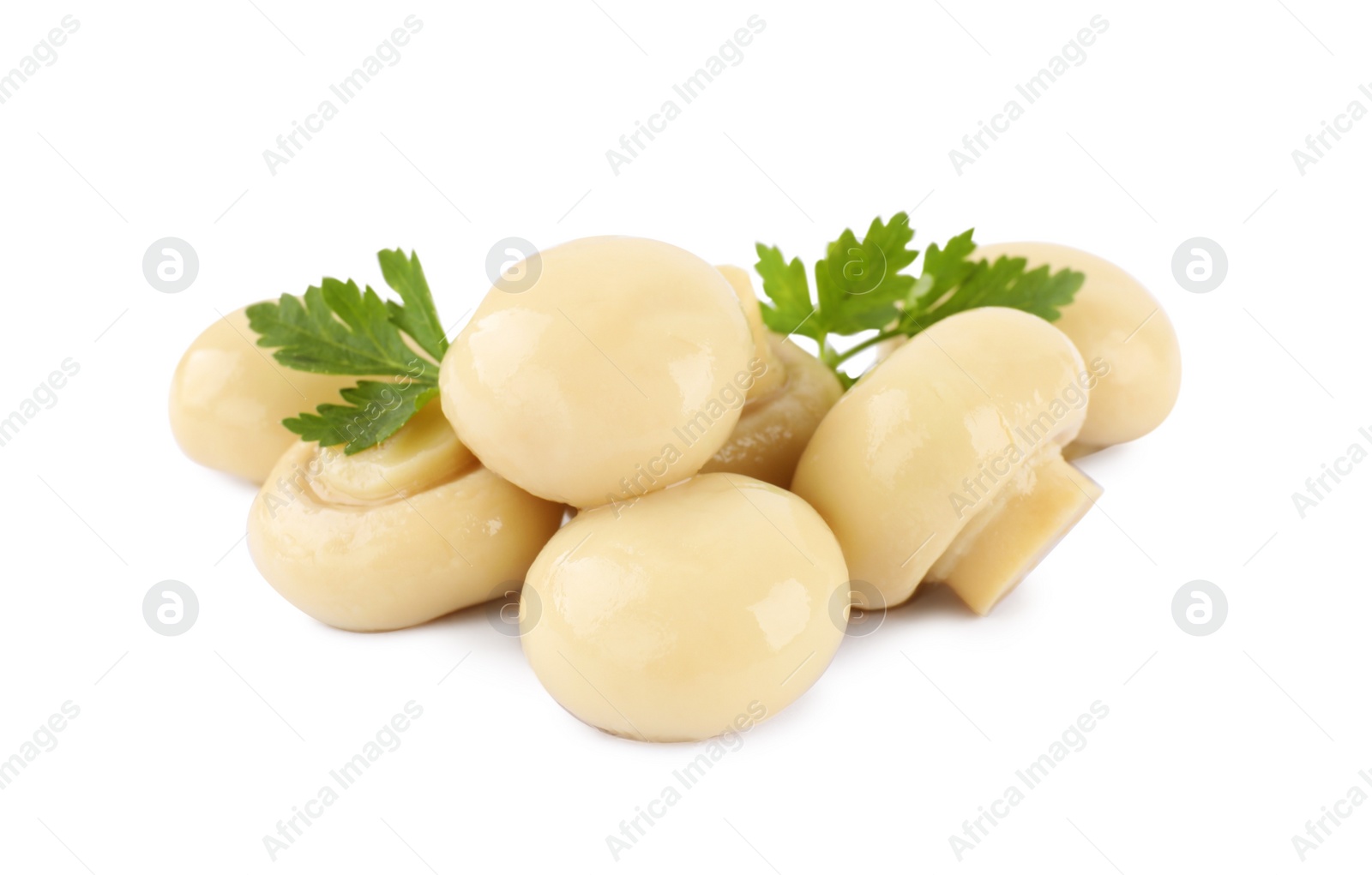 Photo of Delicious marinated mushrooms with parsley isolated on white