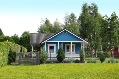 Photo of Exterior of beautiful modern blue house outdoors