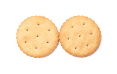 Two crispy crackers isolated on white, top view. Delicious snack