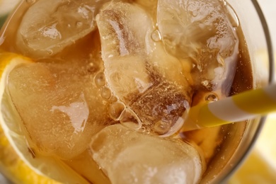 Photo of Glass of lemonade with ice cubes, top view