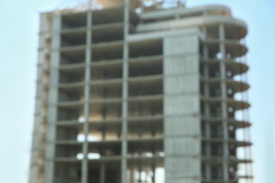 Blurred view of unfinished building against blue sky