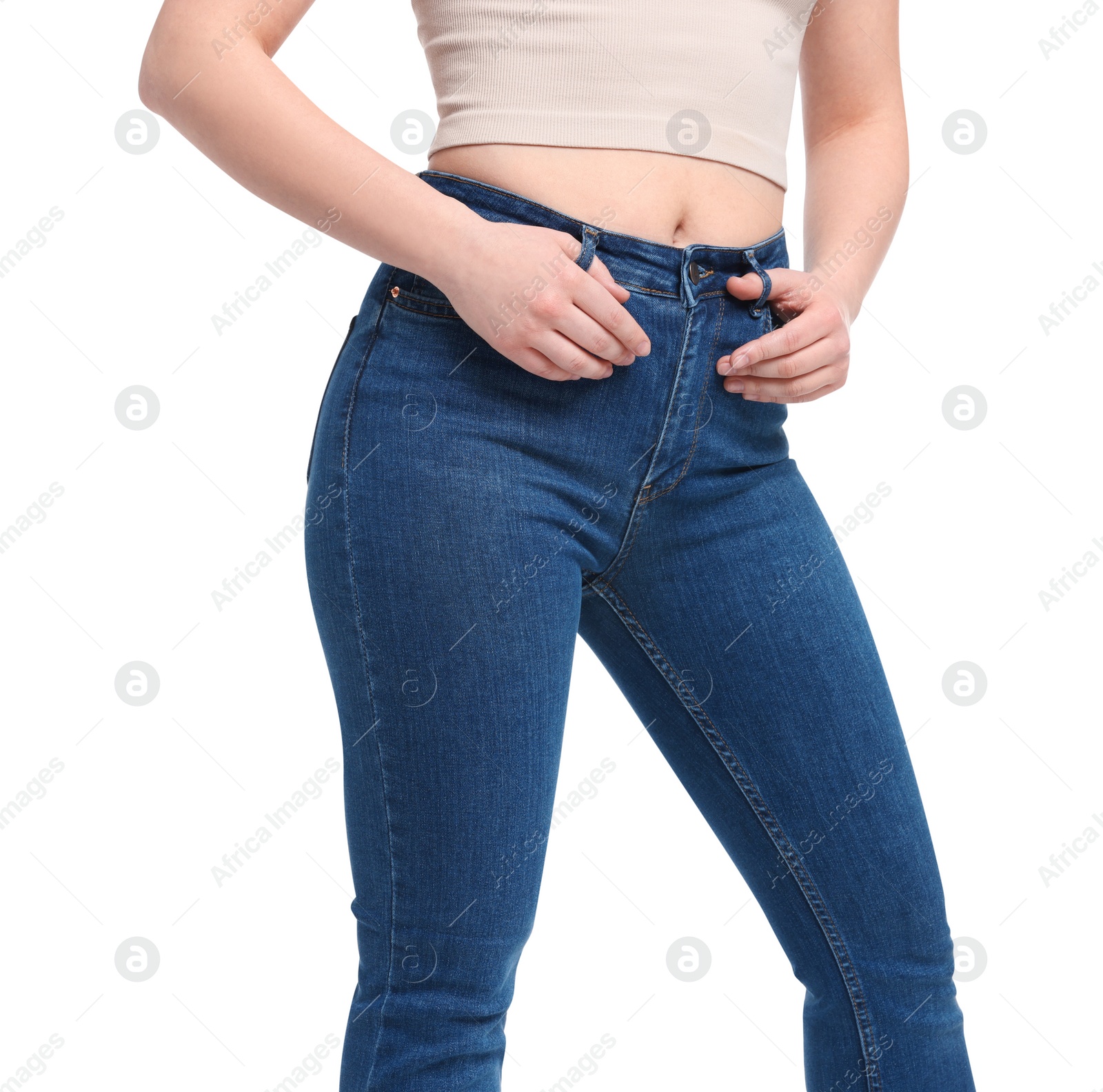 Photo of Woman in stylish jeans on white background, closeup