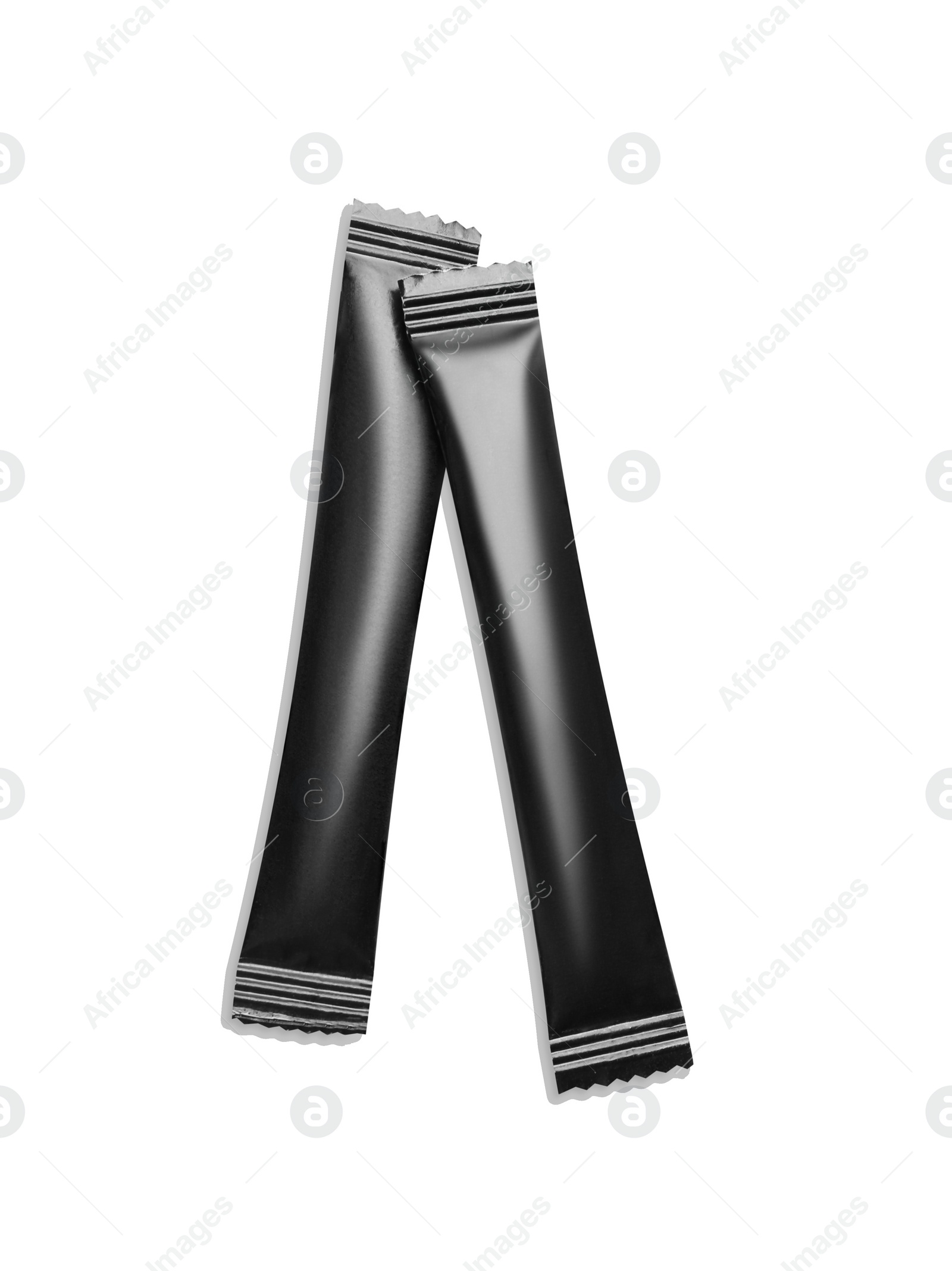 Photo of Black sticks of sugar on white background, top view