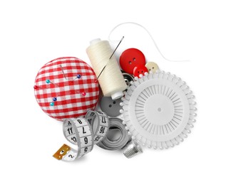 Photo of Spool of thread and sewing tools on white background, top view