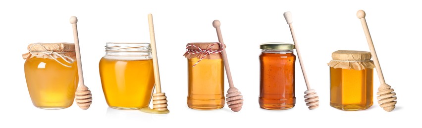 Image of Natural honey in glass jars and dippers isolated on white, set