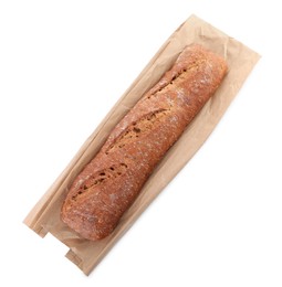 Tasty rye baguette and package isolated on white, top view. Fresh bread