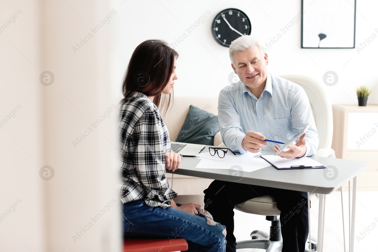 Photo of Human resources manager conducting job interview with applicant in office