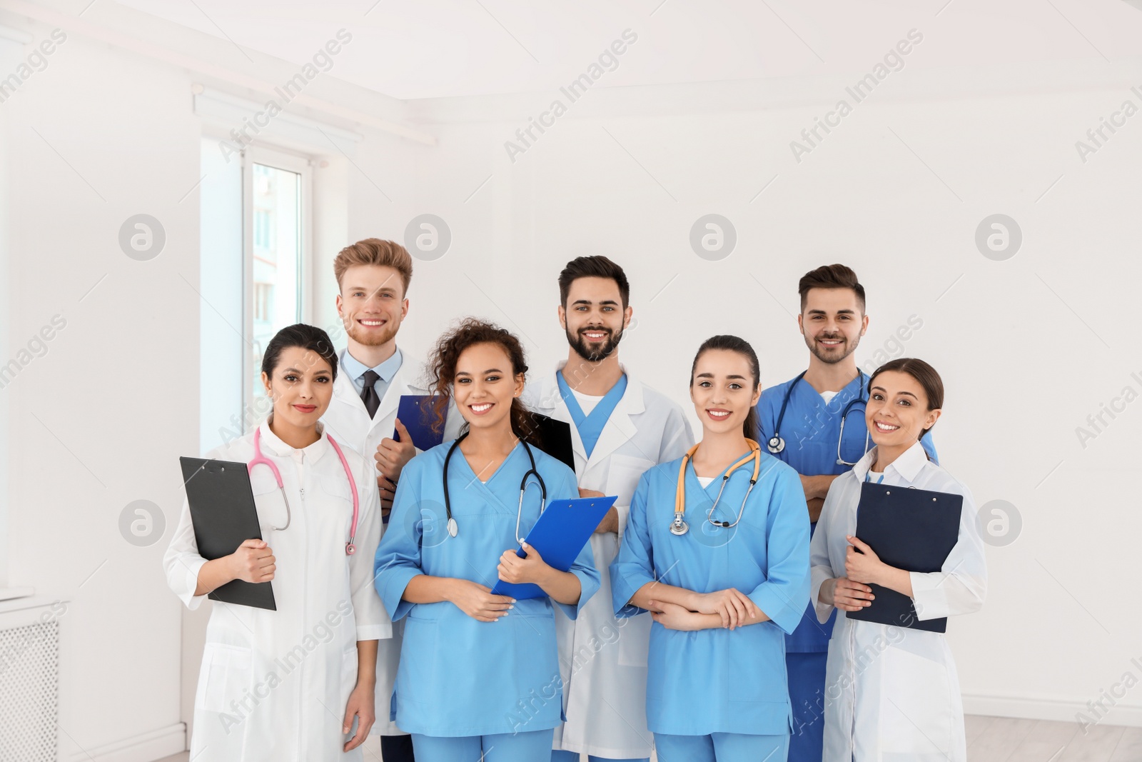 Photo of Team of medical workers in hospital. Unity concept