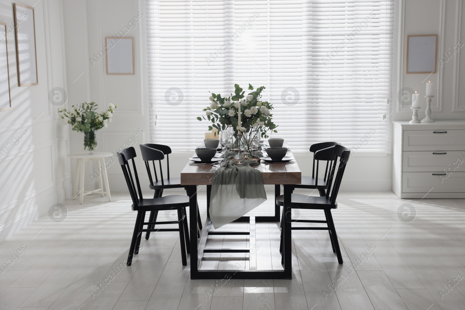 Photo of Festive table setting with beautiful tableware and decor indoors