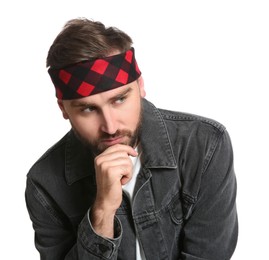 Photo of Fashionable young man in stylish outfit with bandana on white background