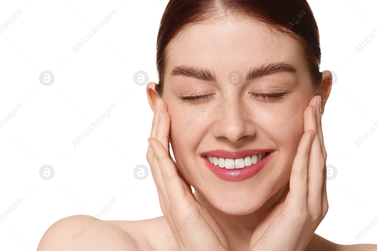 Photo of Portrait of smiling woman on white background, closeup