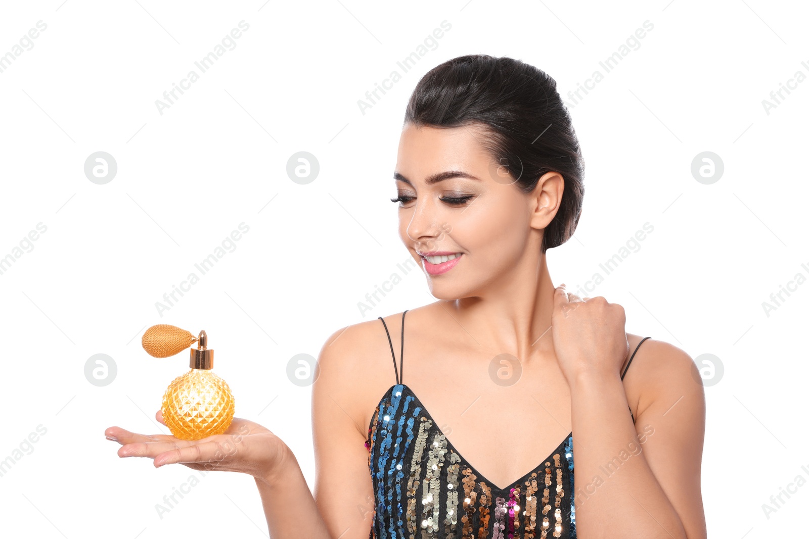 Photo of Young woman with bottle of perfume on white background