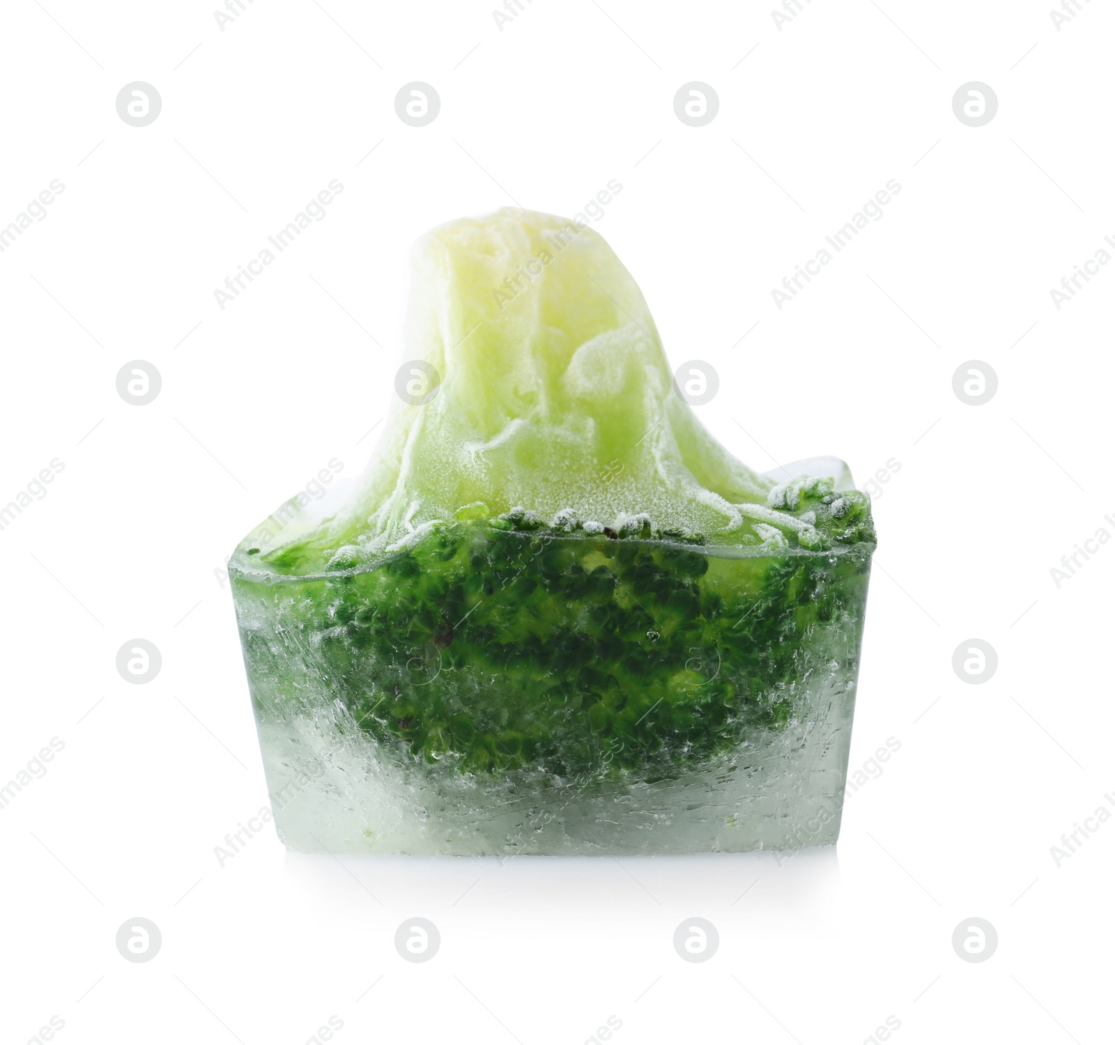 Photo of Fresh broccoli in ice cube on white background. Frozen vegetables