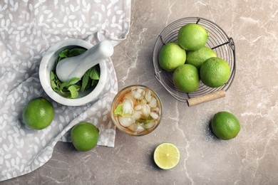 Flat lay composition with delicious mint julep cocktail on table