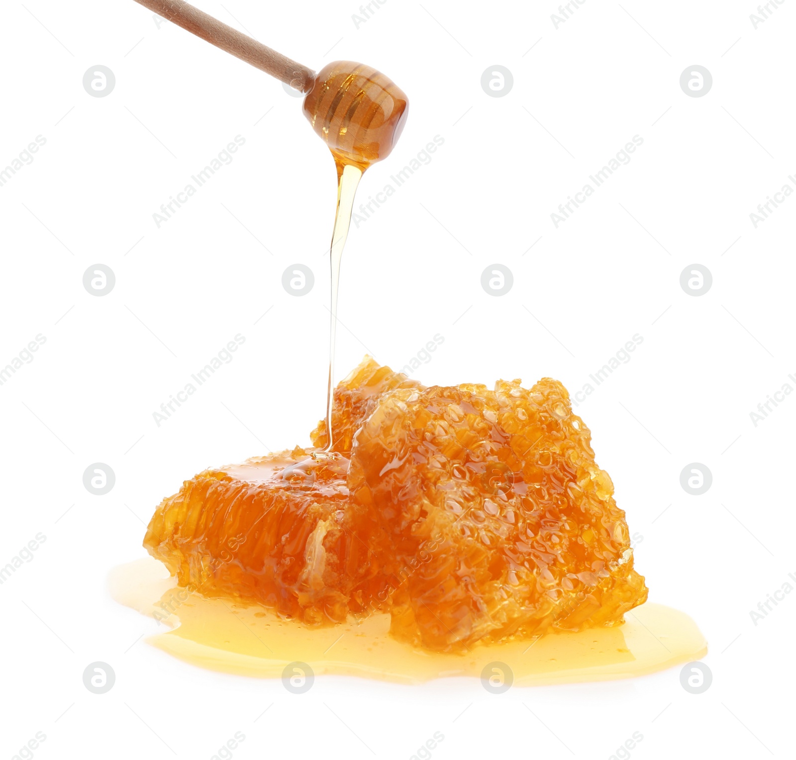 Photo of Fresh honeycombs and dipper on white background