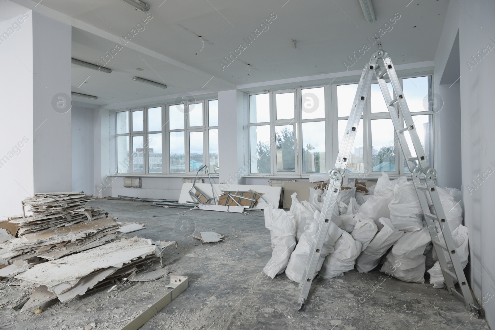 Photo of Used building materials in room prepared for renovation