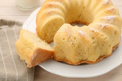 Photo of Delicious freshly baked sponge cake on table, closeup