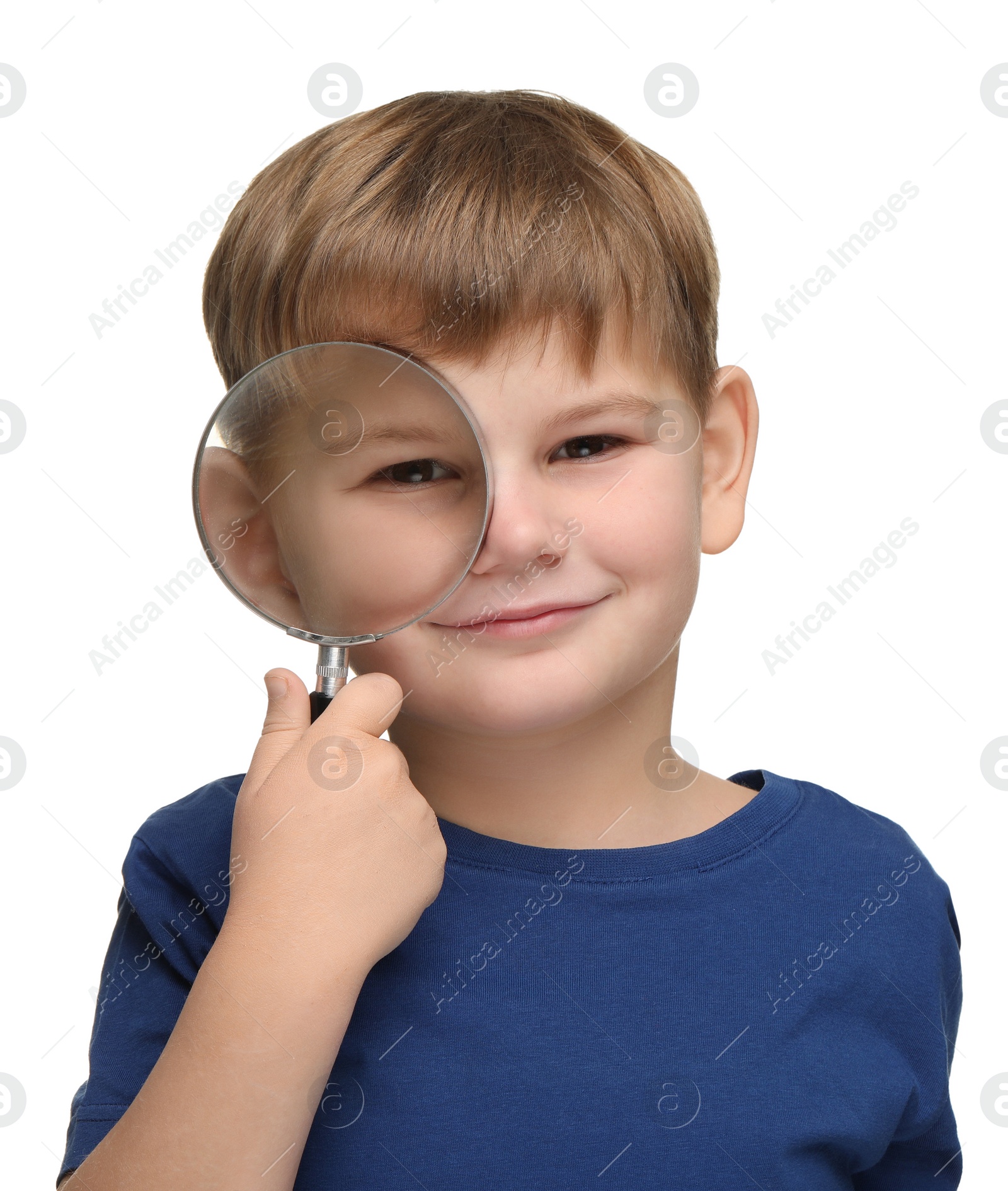 Photo of Little boy with magnifying glass on white background