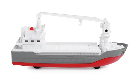 Photo of Toy cargo vessel isolated on white. Export concept
