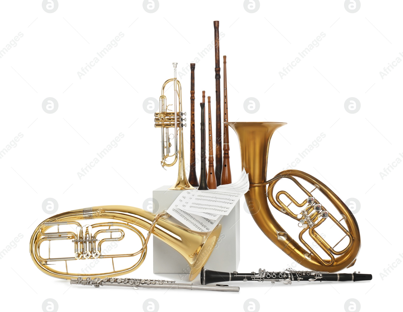 Photo of Set of wind musical instruments on white background