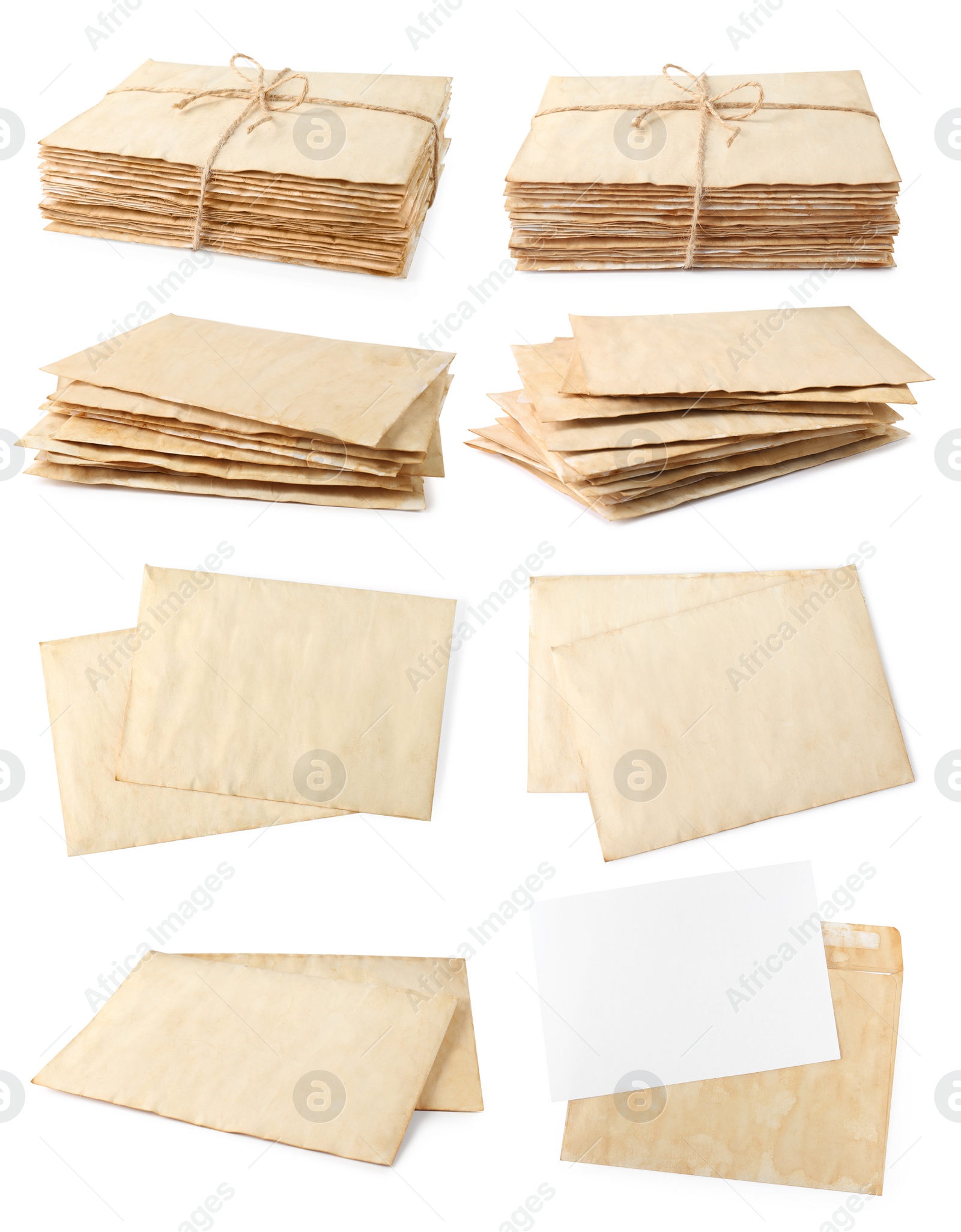 Image of Set with stacks of old letters on white background