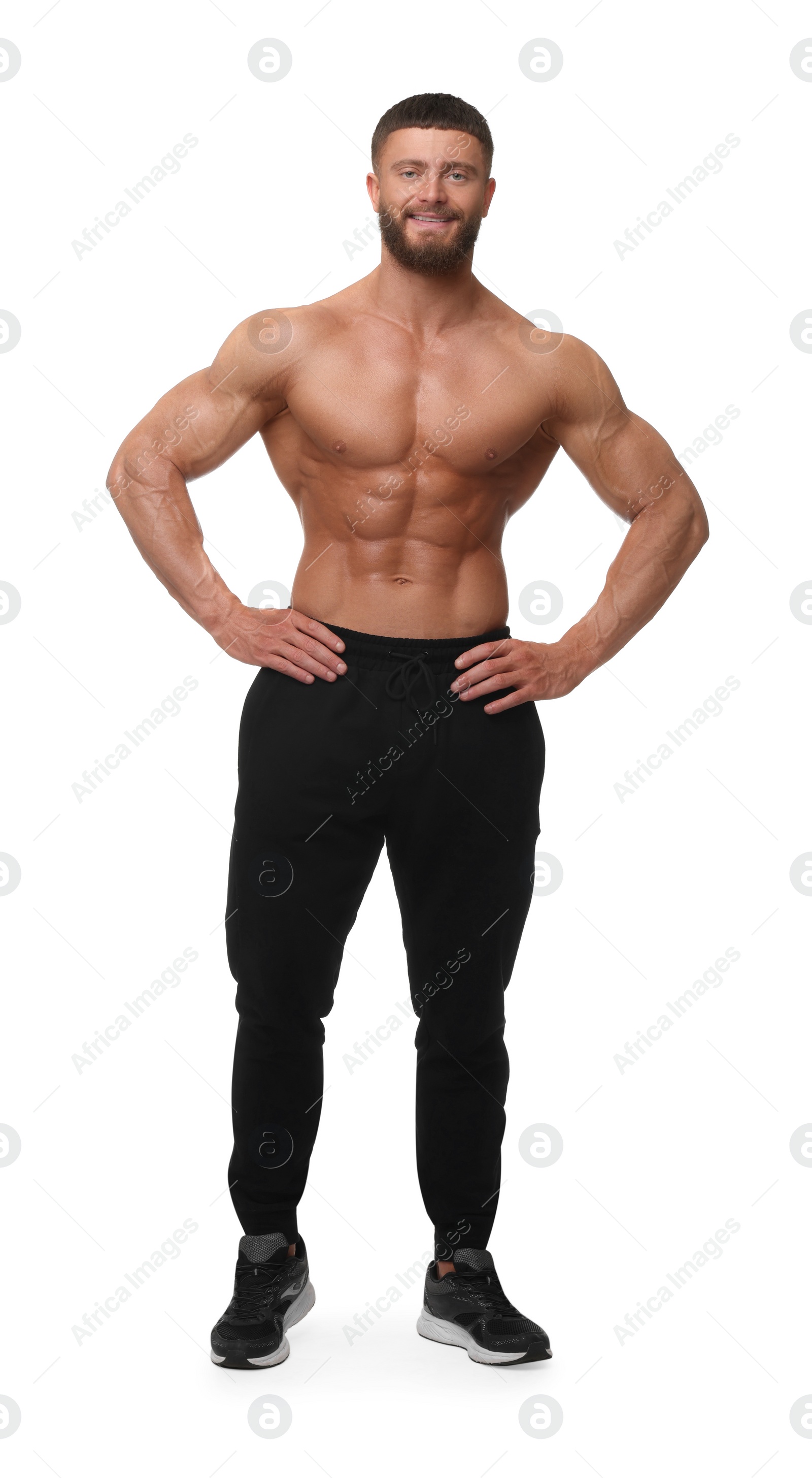 Photo of Young bodybuilder with muscular body on white background