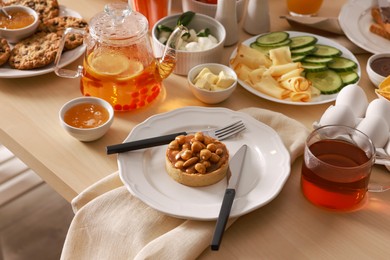 Photo of Dishes with different food on table. Luxury brunch