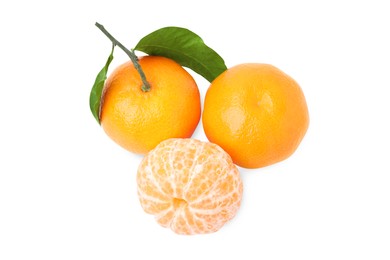 Photo of Fresh ripe juicy tangerines with green leaves on white background, top view