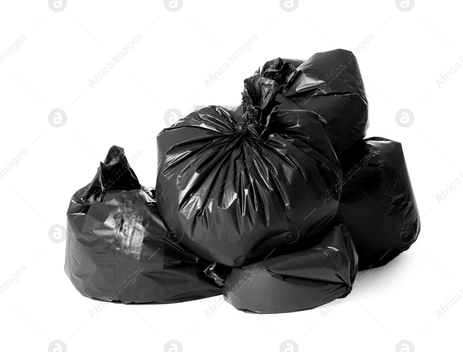 Photo of Trash bags full of garbage isolated on white