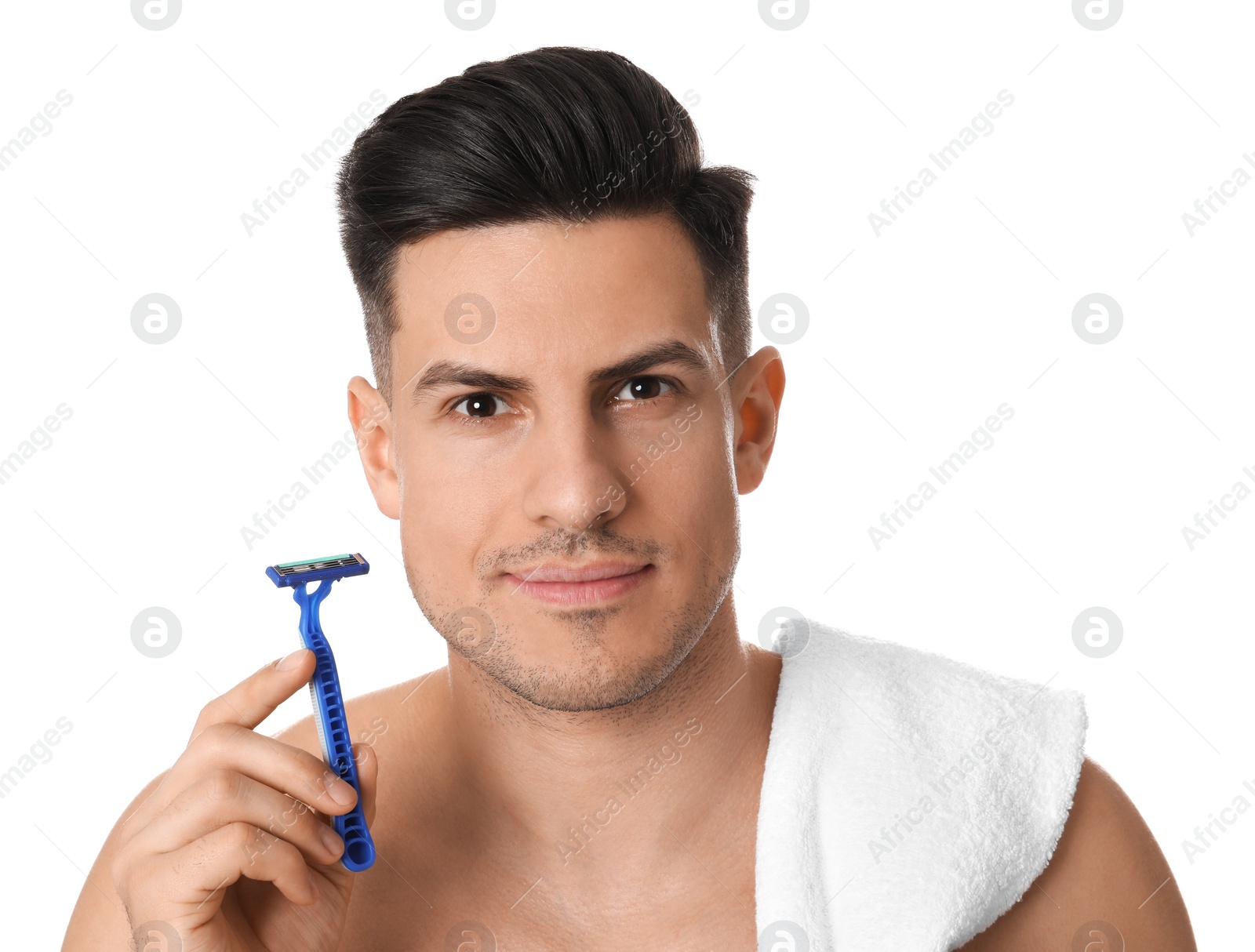 Photo of Handsome man with razor before shaving on white background