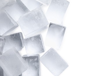 Photo of Many clear ice cubes on white background, top view