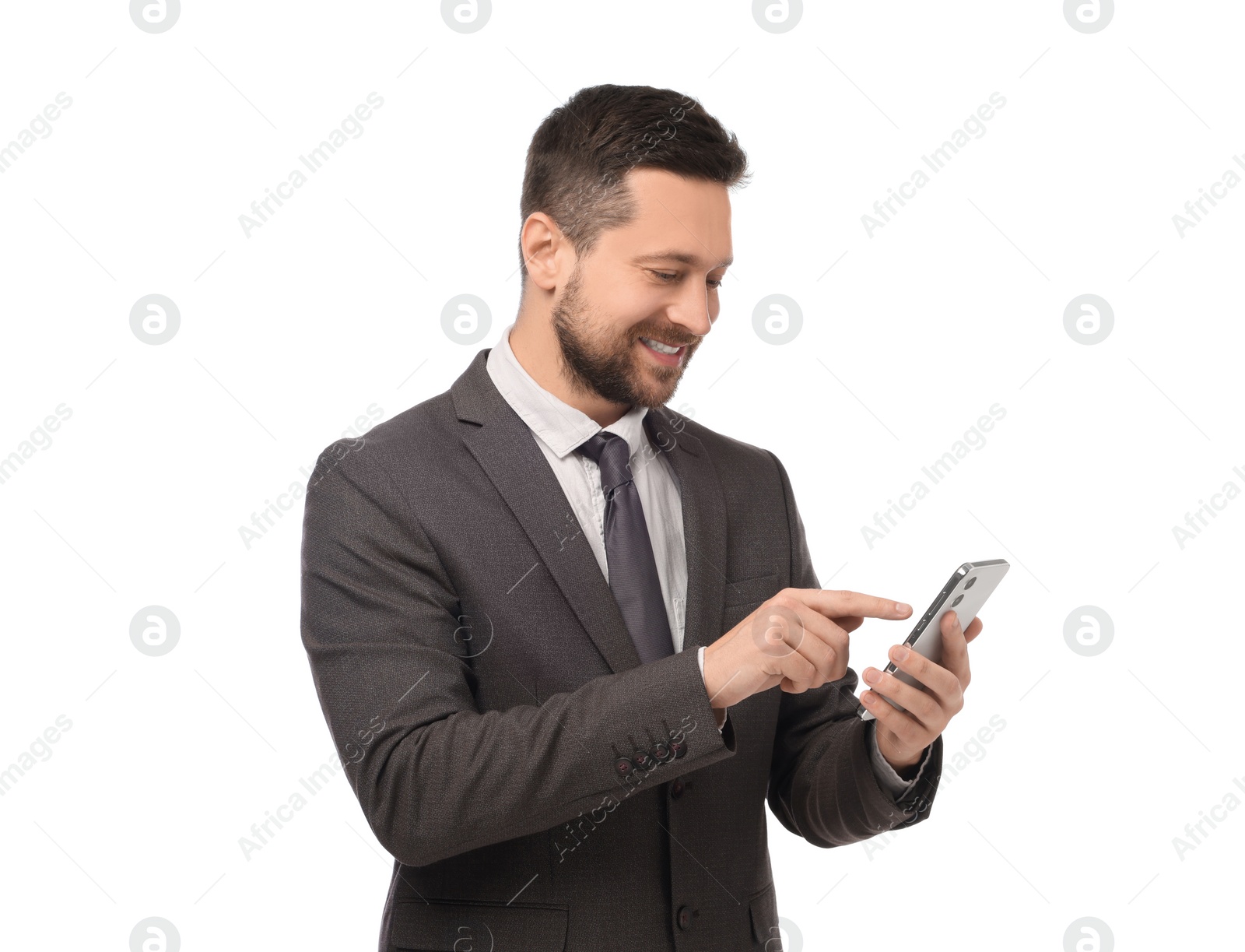 Photo of Happy man sending message via smartphone on white background