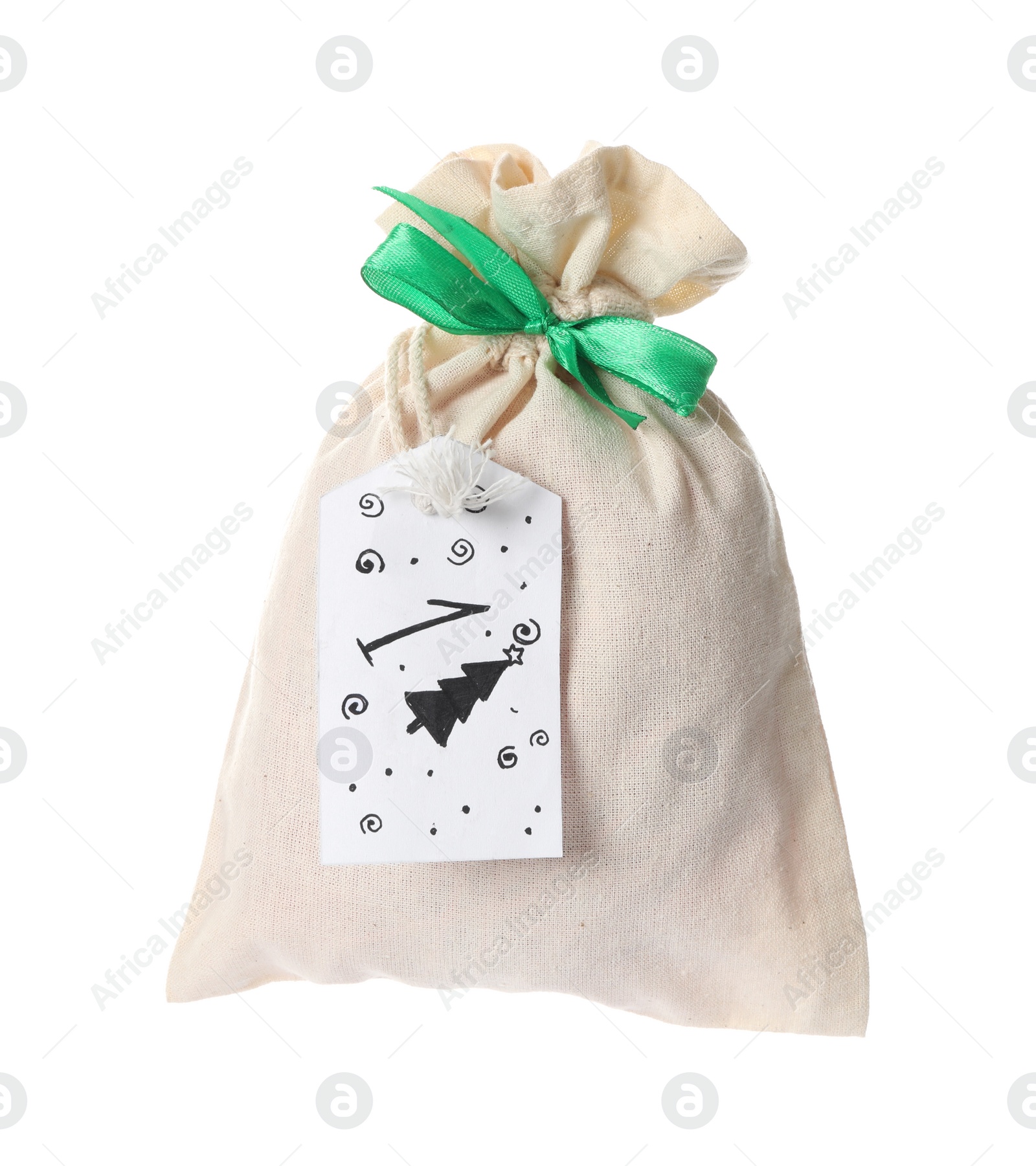 Photo of Small bag and paper tag with number 1 isolated on white. Christmas advent calendar