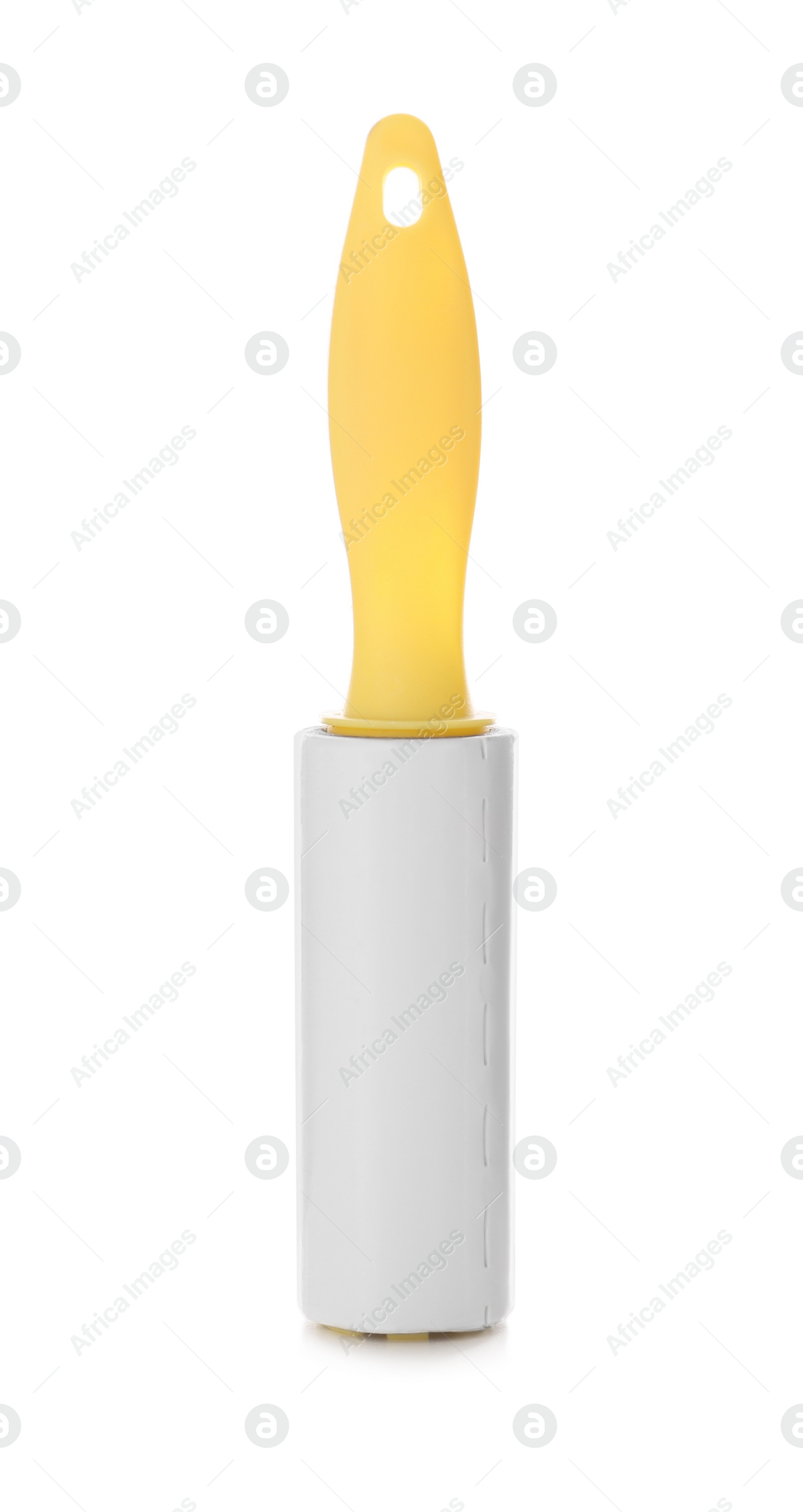 Photo of New lint roller with yellow handle isolated on white